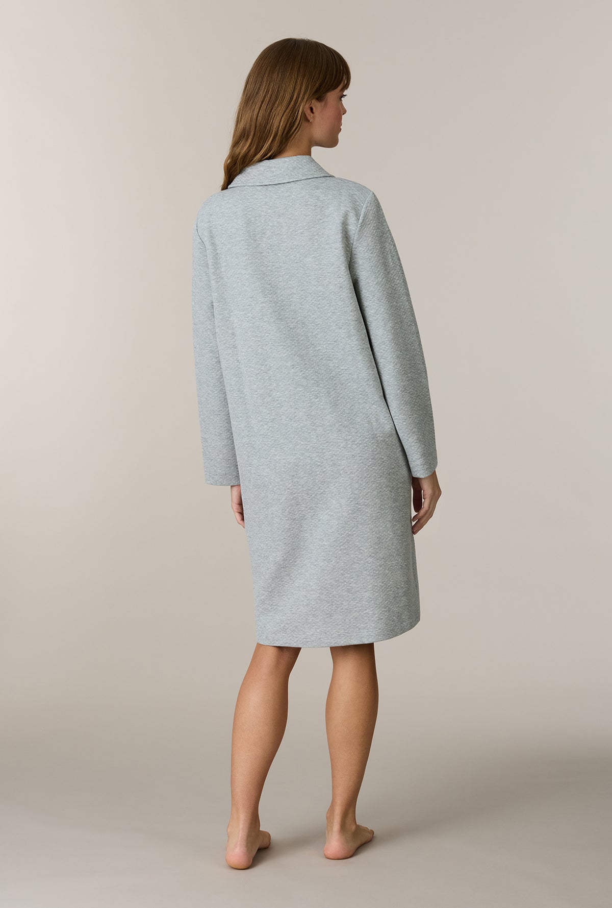 A lady wearing Grey Heather Cotton Diamond Quilted Zip Robe back view