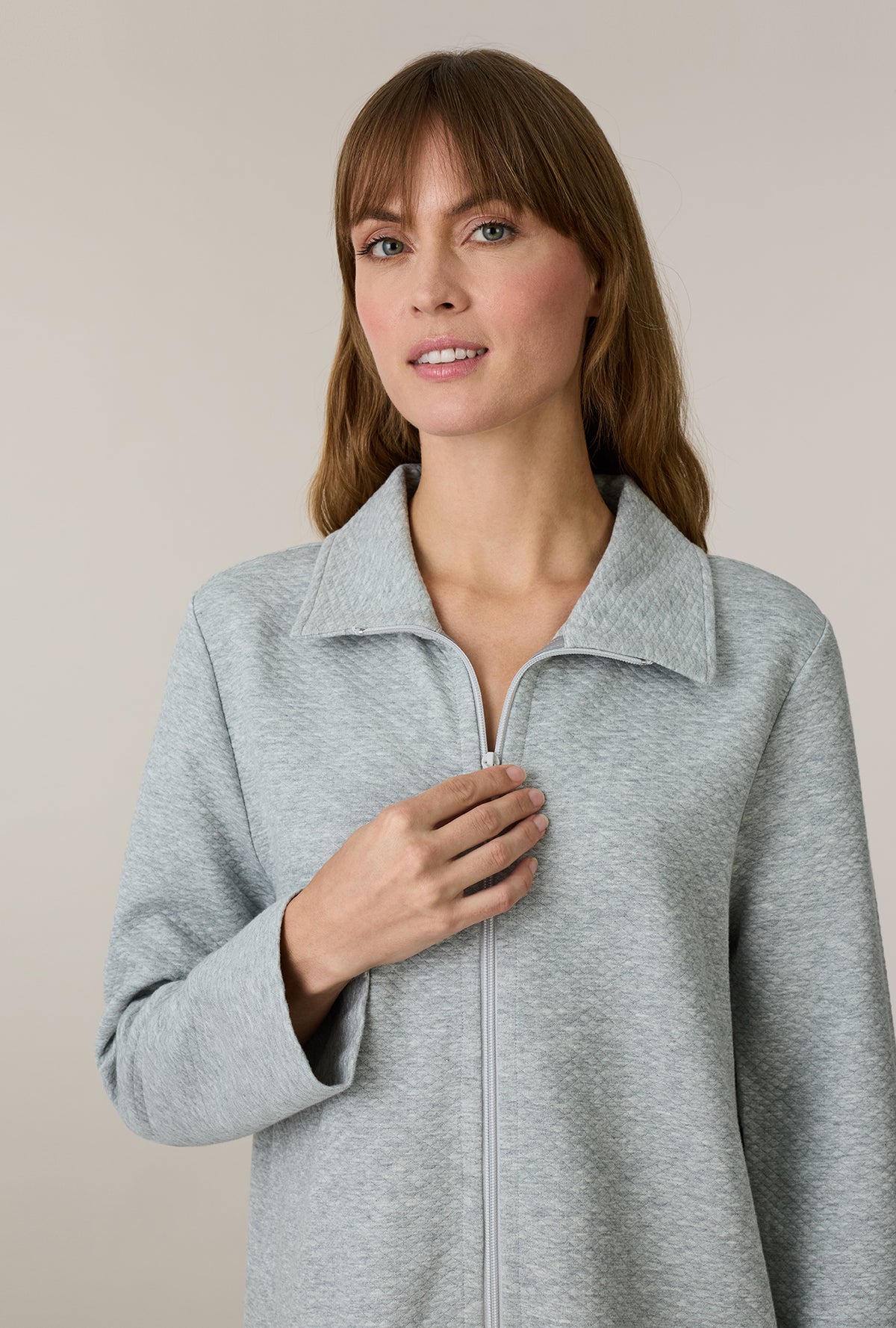 A lady wearing Grey Heather Cotton Diamond Quilted Zip Robe closer look