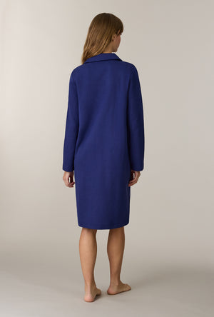A lady wearing Midnight Navy Cotton Diamond Quilted Zip Robe back view