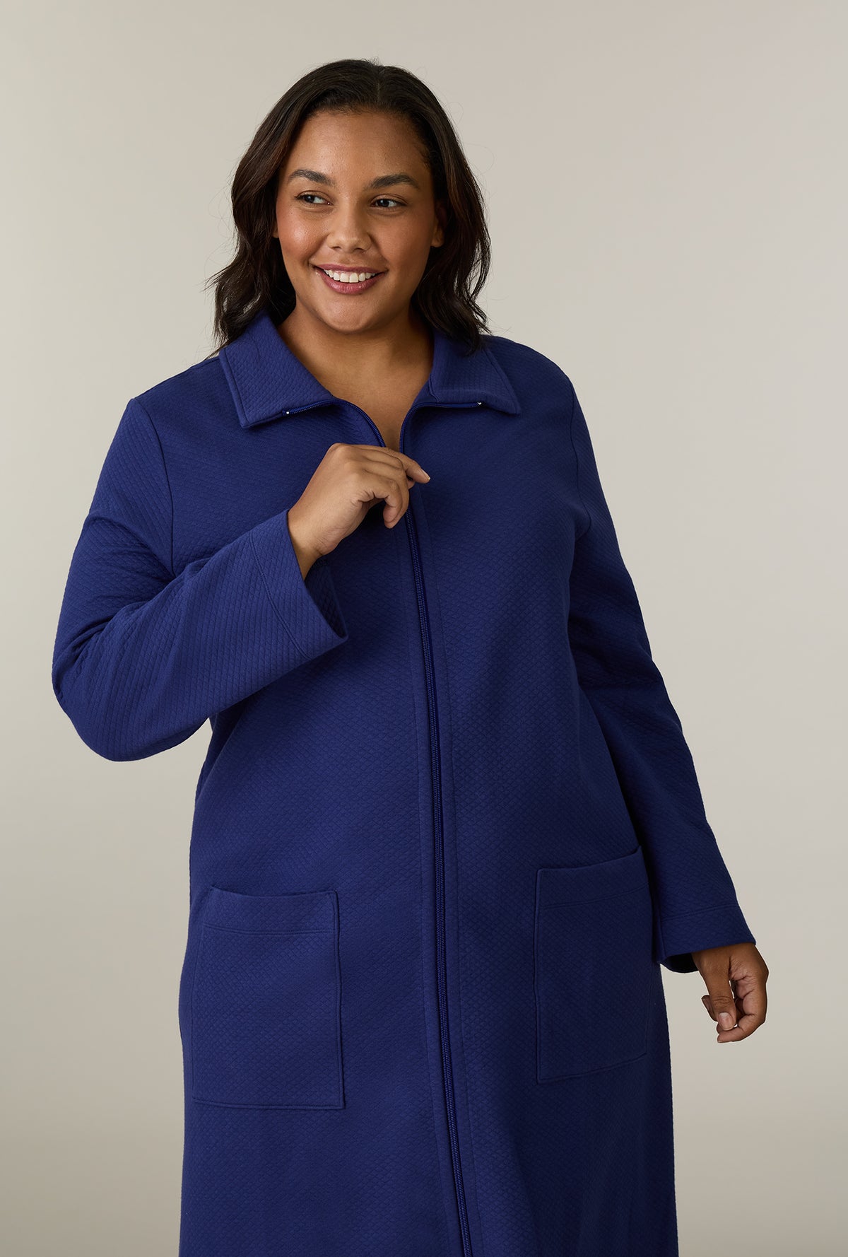 A lady wearing plus size Midnight Navy Cotton Diamond Quilted Zip Robe closer look