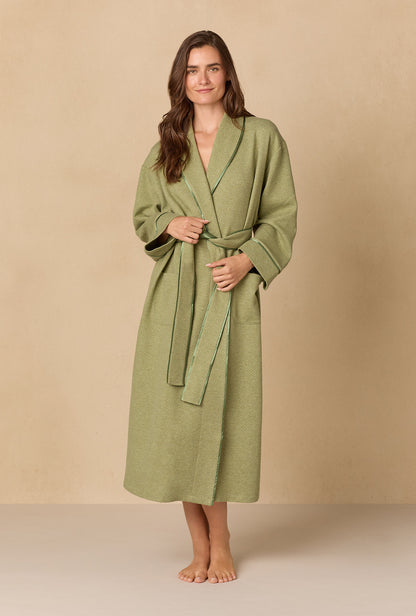 A lady wearing Heather Sage Diamond Quilted Wrap Robe