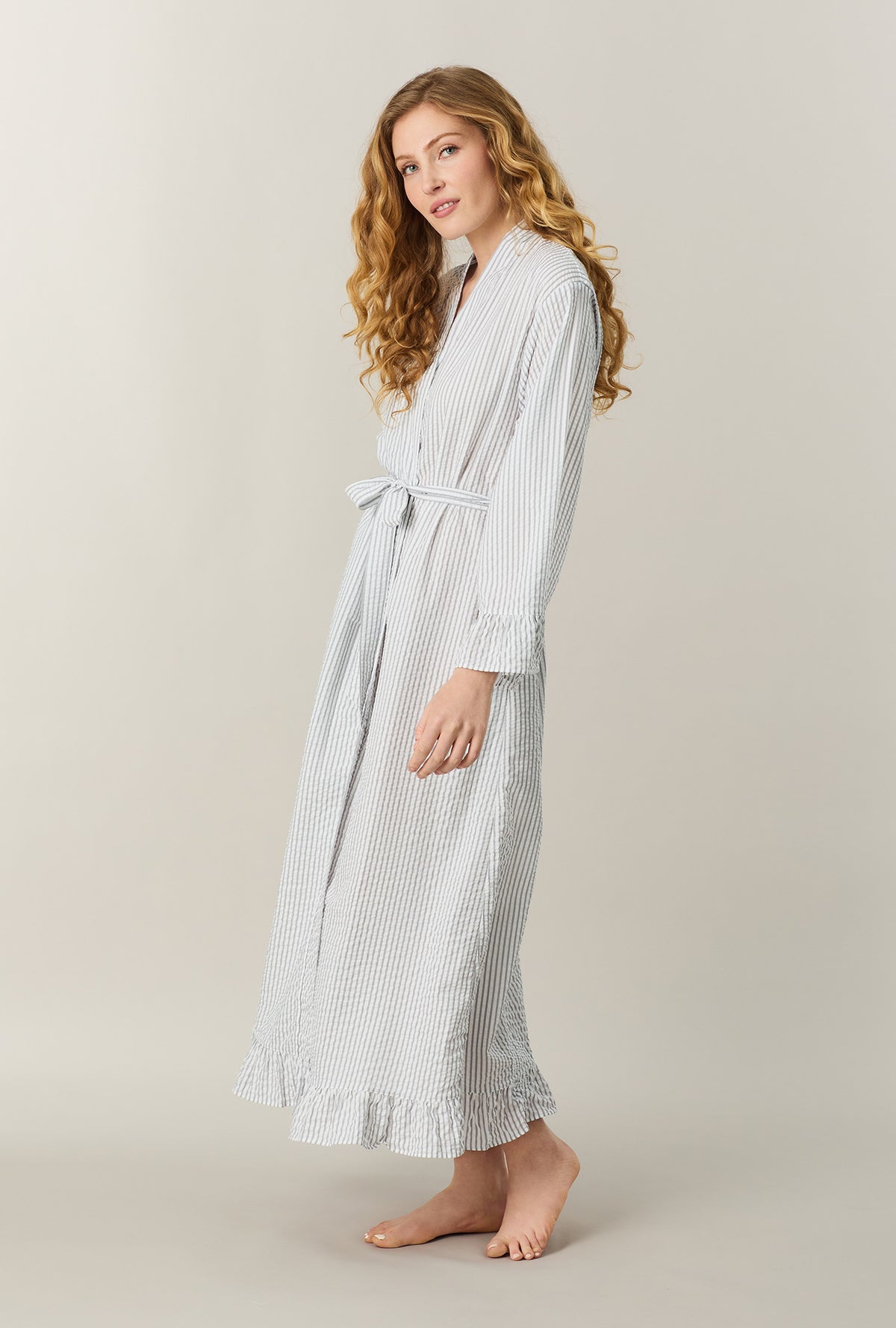 A lady wearing Grey Stripe Seersucker Long Robe side view