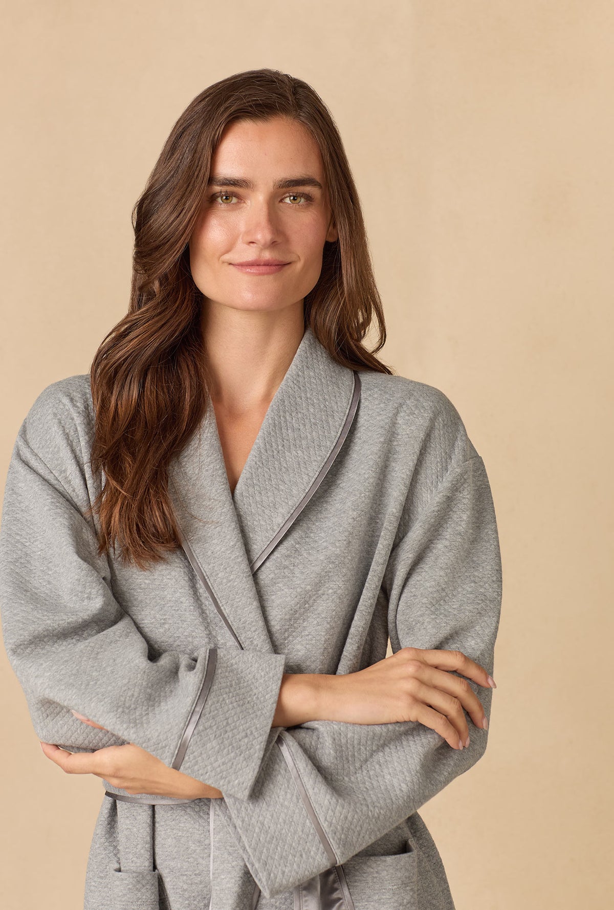 A lady wearing Heather Grey Diamond Quilted Wrap Robe