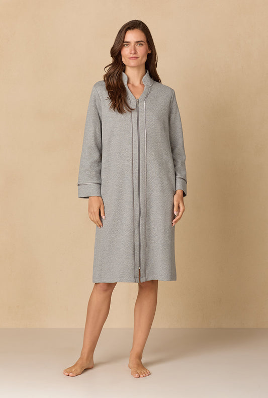 A lady wearing Heather Grey Diamond Quilted Zip Robe