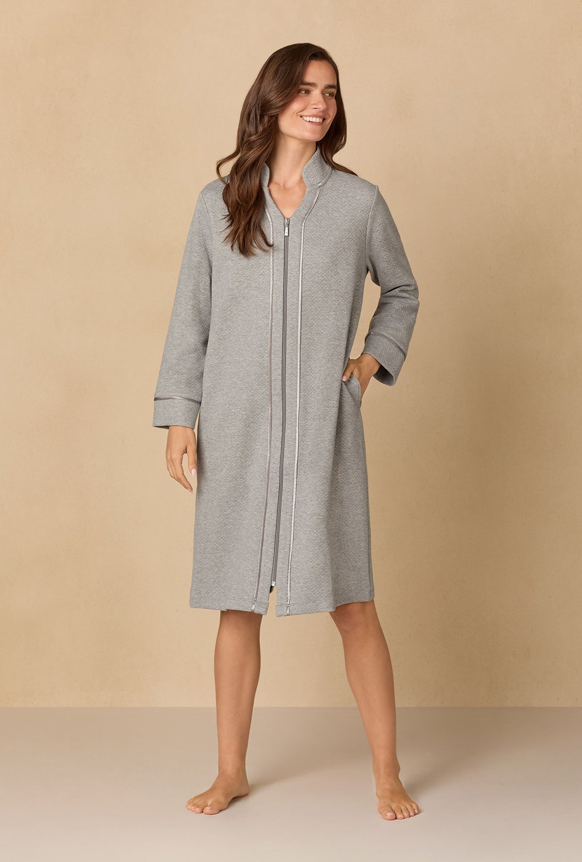 A lady wearing Heather Grey Diamond Quilted Zip Robe