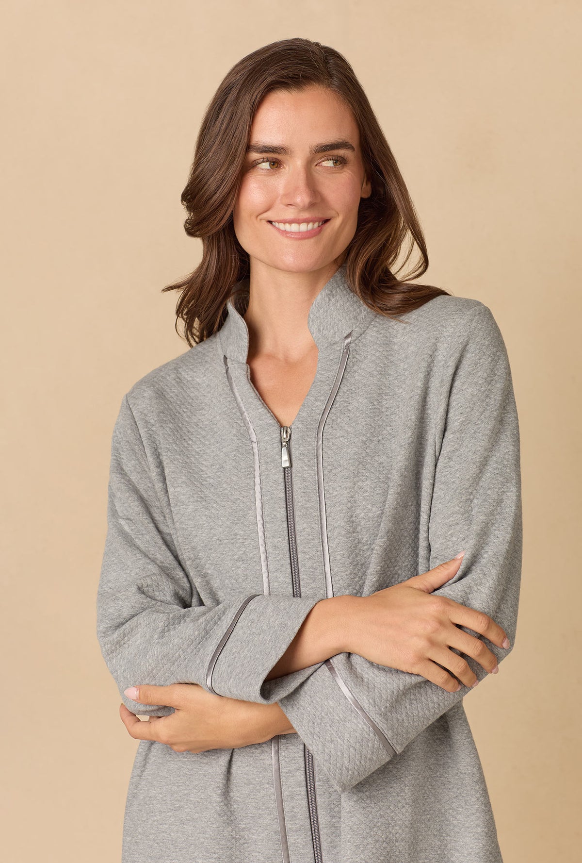 A lady wearing Heather Grey Diamond Quilted Zip Robe