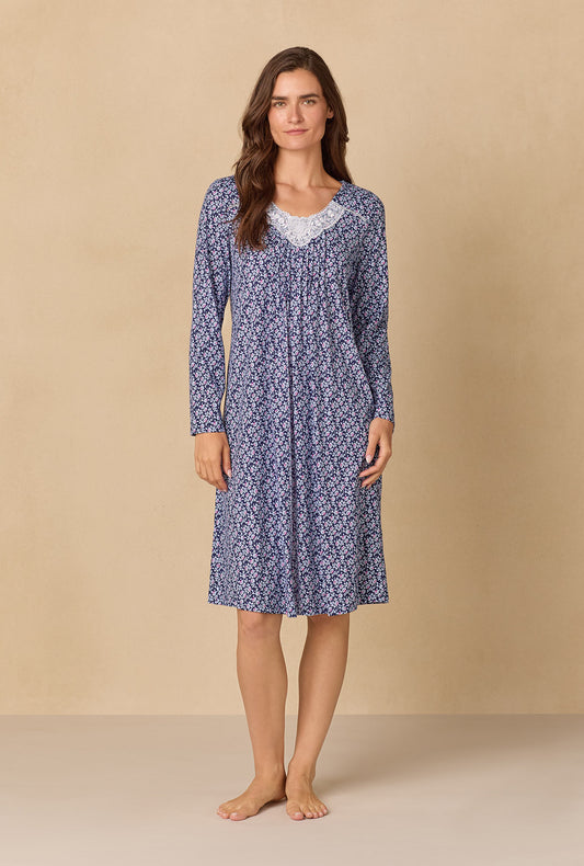 A lady wearing Navy Reverie Ditsy Waltz Cotton Knit Nightgown