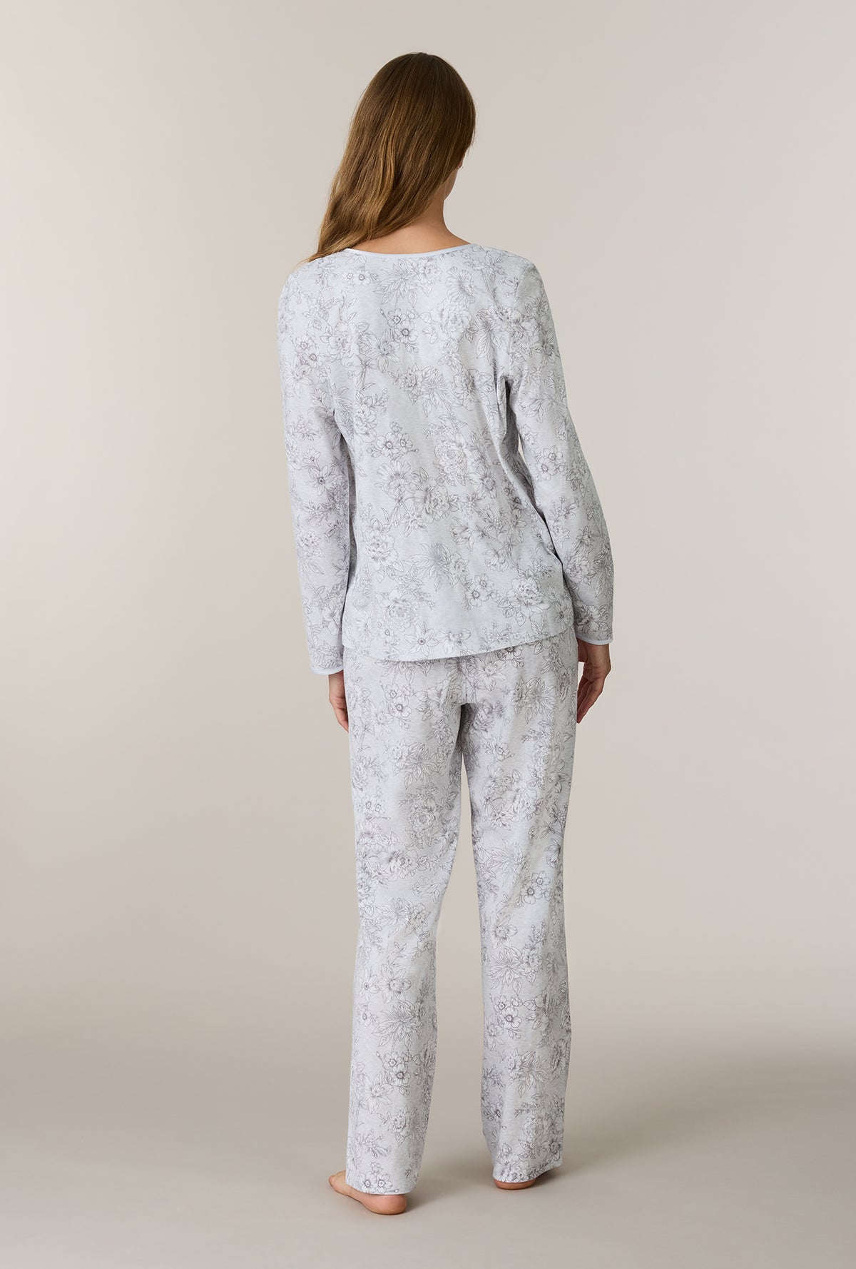 A lady wearing Whisper Garden Cotton Long Pajama Set back view