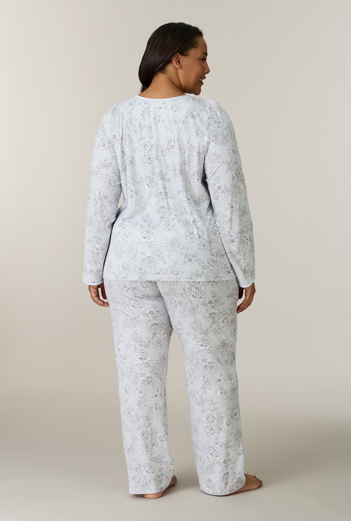 A lady wearing plus size Whisper Garden Cotton Long Pajama Set back view