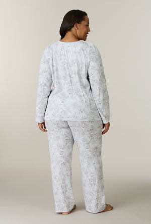 A lady wearing plus size Whisper Garden Cotton Long Pajama Set back view