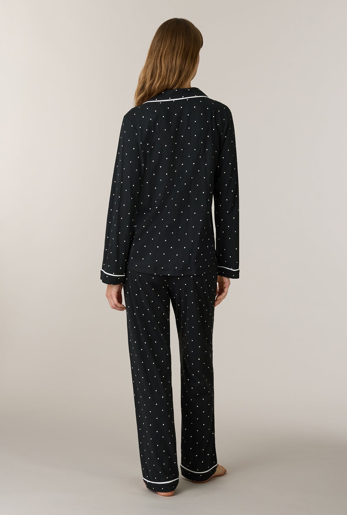 A lady wearing Midnight Hearts Cotton Notch Collar Long Pajama Set back view