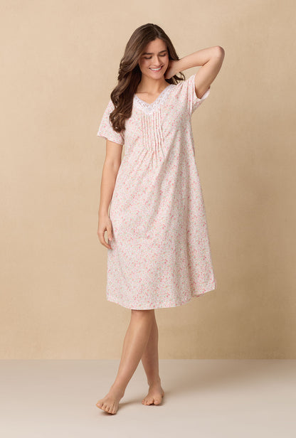 A lady wearing Meadow Floral Waltz Cotton Knit Nightgown