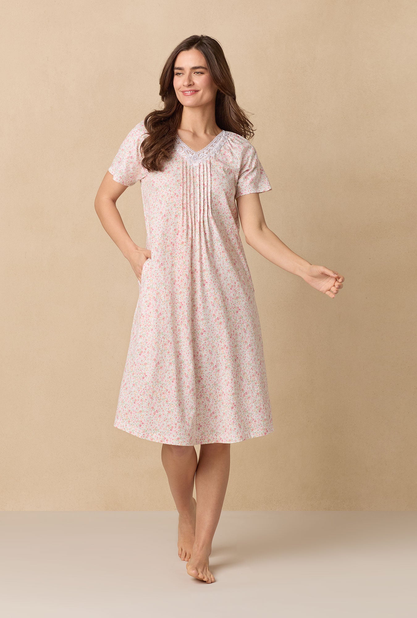 A lady wearing Meadow Floral Waltz Cotton Knit Nightgown