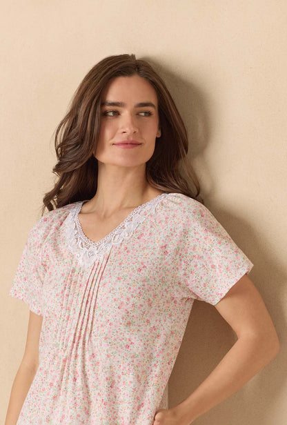 A lady wearing Meadow Floral Waltz Cotton Knit Nightgown