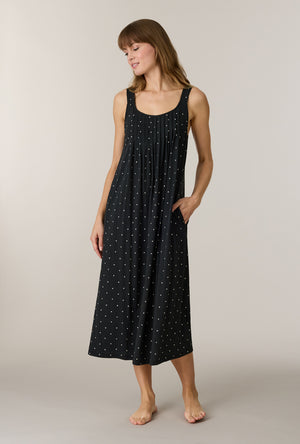 A lady wearing Midnight Hearts Cotton Long Chemise looking down