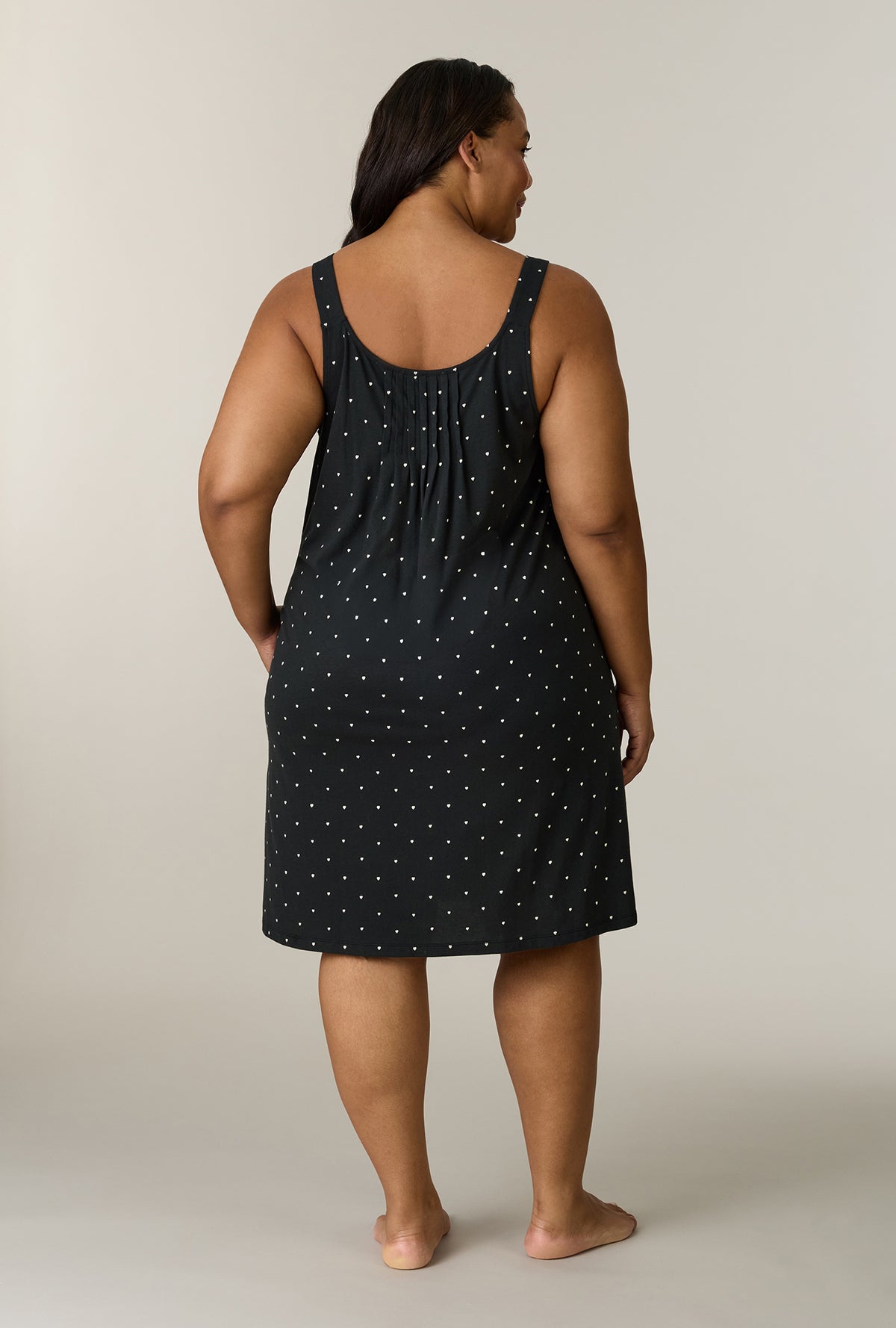 A lady wearing plus size Midnight Hearts Cotton Short Chemise back view