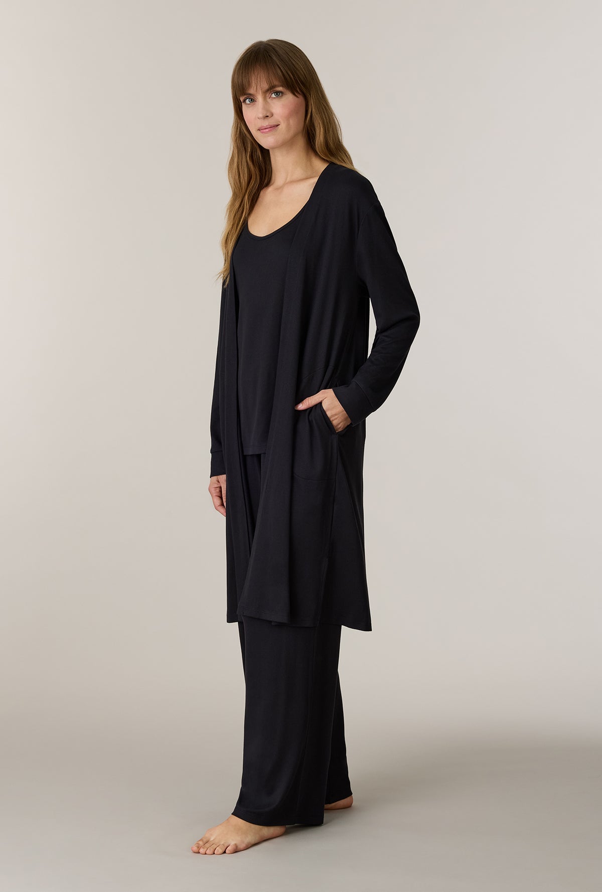 A lady wearing Black 3-Piece Brushed Sweater Knit Pajama Set