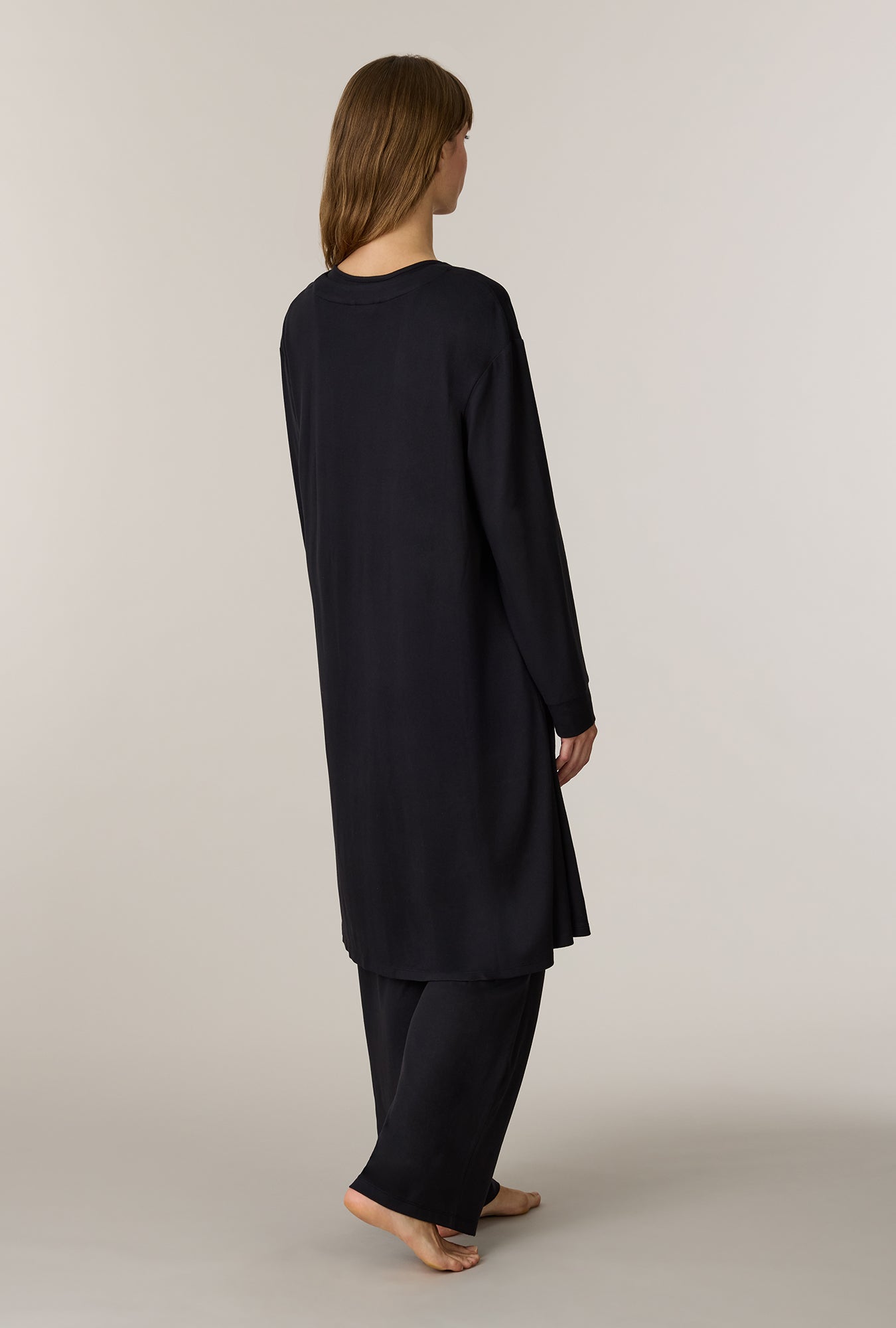 A lady wearing Black 3-Piece Brushed Sweater Knit Pajama Set