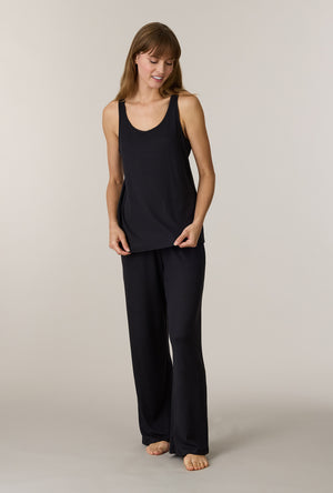 A lady wearing Black 3-Piece Brushed Sweater Knit Pajama Set without robe