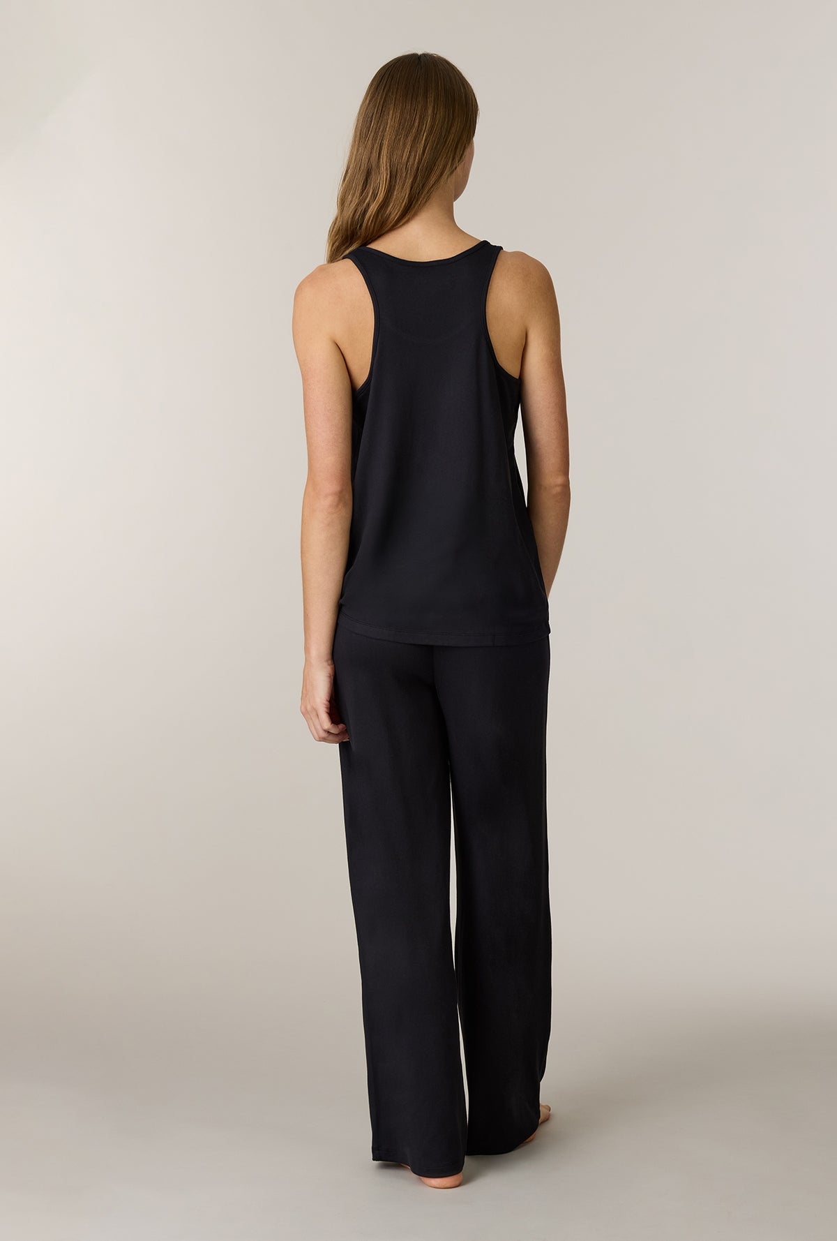 A lady wearing Black 3-Piece Brushed Sweater Knit Pajama Set without robe back view