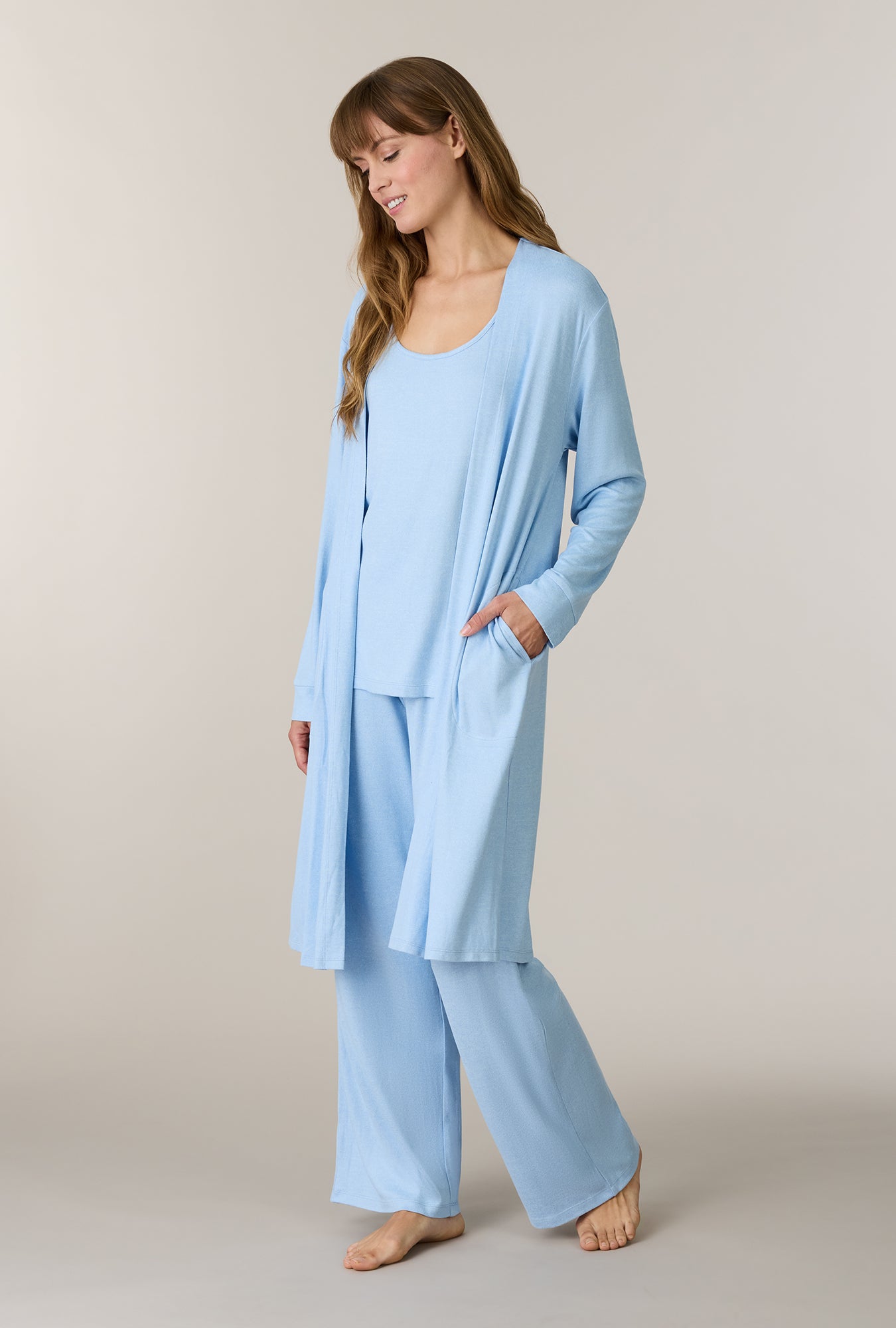 A lady wearing Heather Sky Blue 3-Piece Brushed Sweater Knit Pajama Set