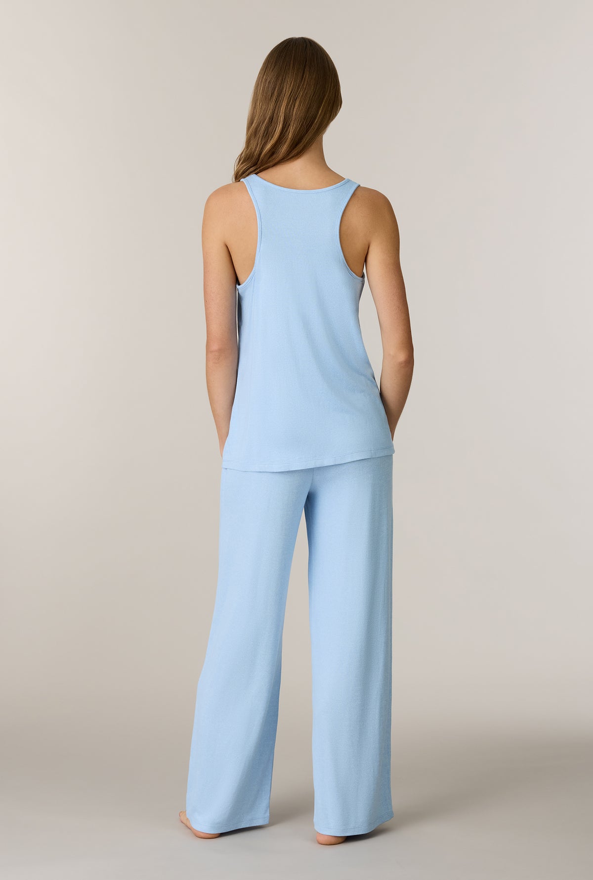 A lady wearing Heather Sky Blue 3-Piece Brushed Sweater Knit Pajama Set without robe back view
