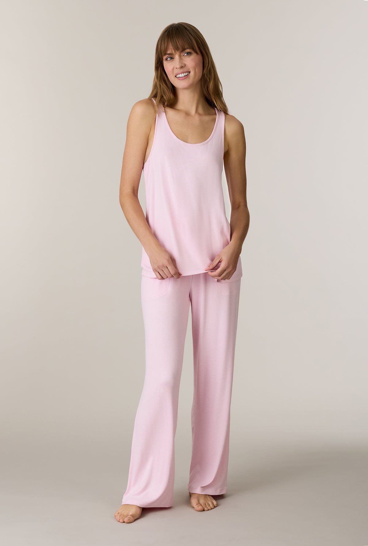 A lady wearing Heather Blush 3-Piece Brushed Sweater Knit Pajama Set without robe 