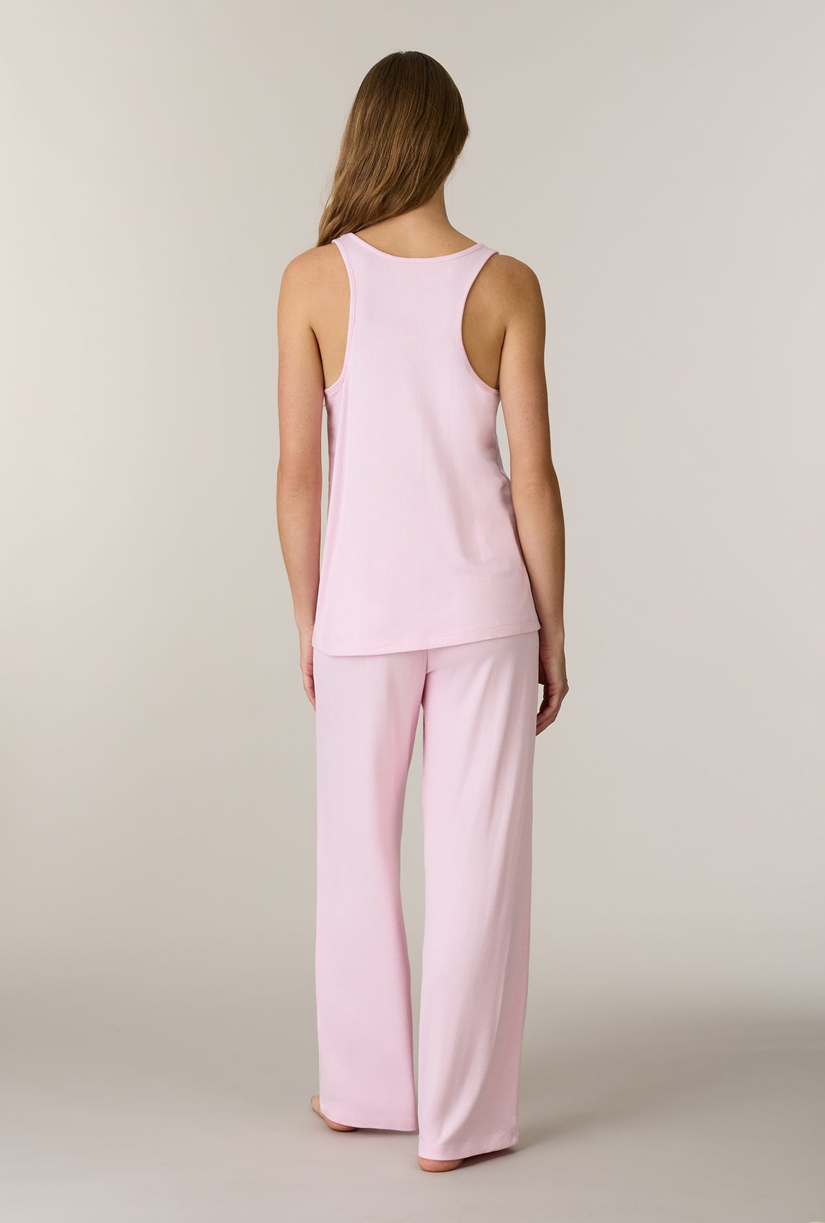 A lady wearing Heather Blush 3-Piece Brushed Sweater Knit Pajama Set without robe back view