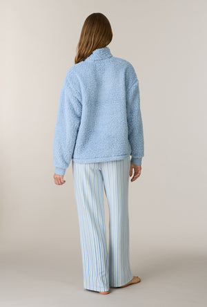 A lady wearing Coastal Stripe Sherpa Zip Top & Stretch Fleece Pajama Set back view