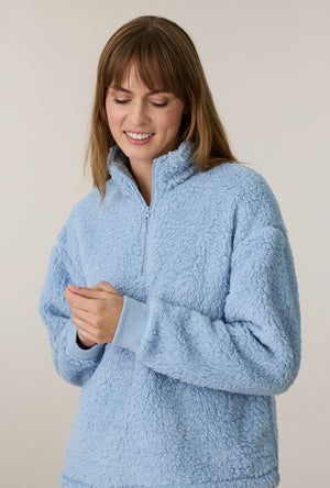 A lady wearing Coastal Stripe Sherpa Zip Top & Stretch Fleece Pajama Set closer look