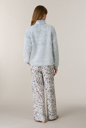 A lady wearing Soft Leopard Sherpa Zip Top & Stretch Fleece Pajama Set back view