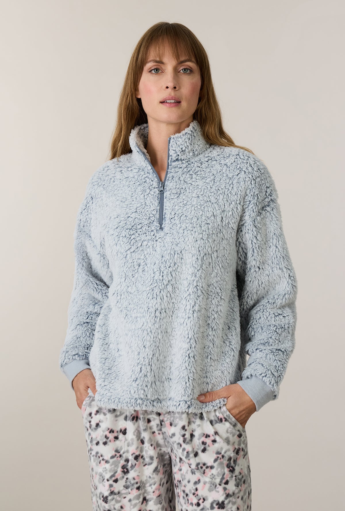 A lady wearing Soft Leopard Sherpa Zip Top & Stretch Fleece Pajama Set closer look