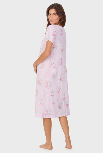 A lady wearing Pink Cosmos Cap Sleeve Cotton Waltz Nightgown