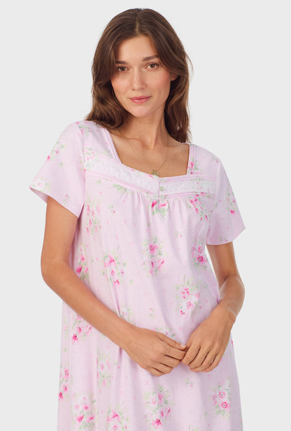 A lady wearing Pink Cosmos Cap Sleeve Cotton Waltz Nightgown