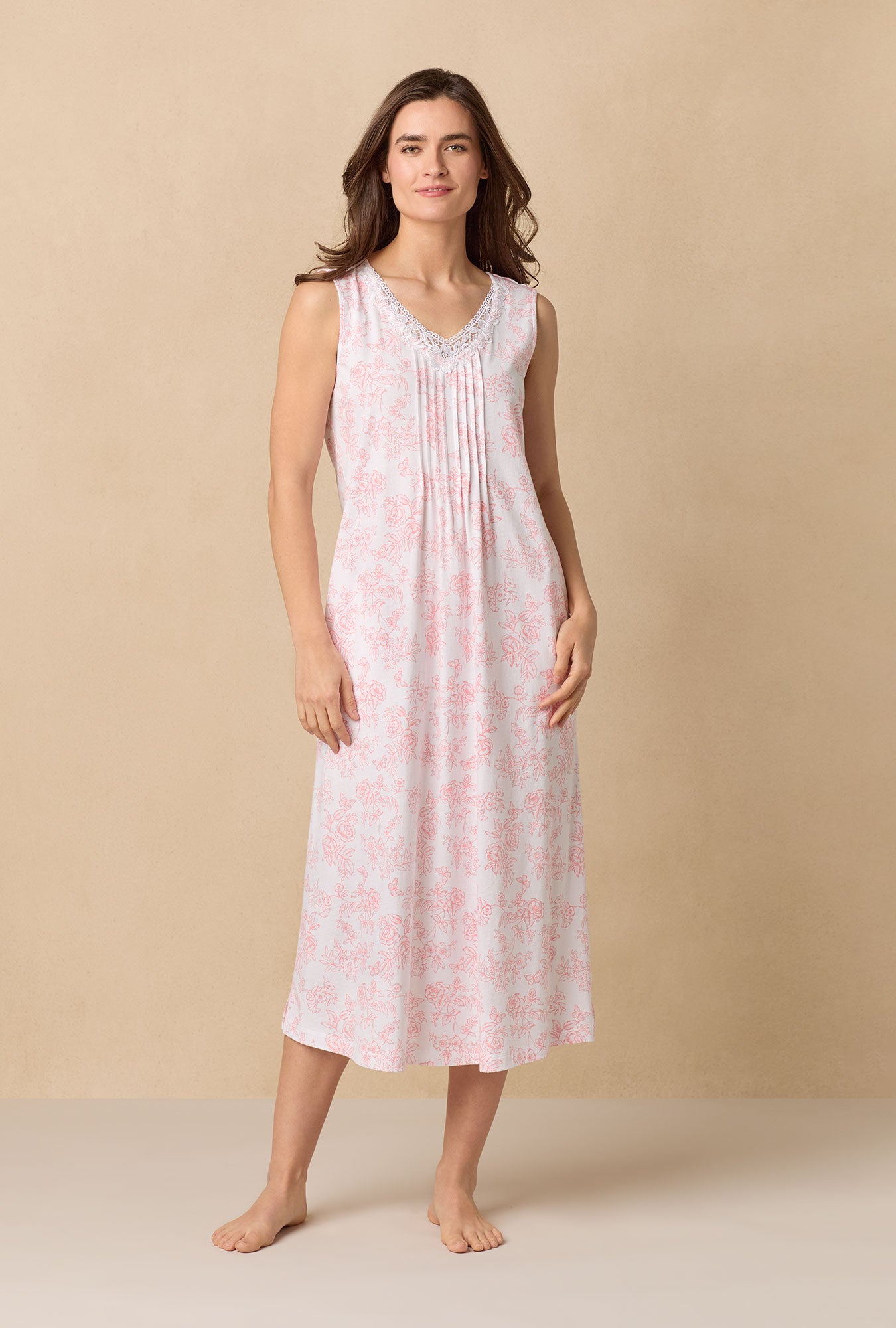 A lady wearing Coral Toile Long Sleeveless Cotton Knit Nightgown
