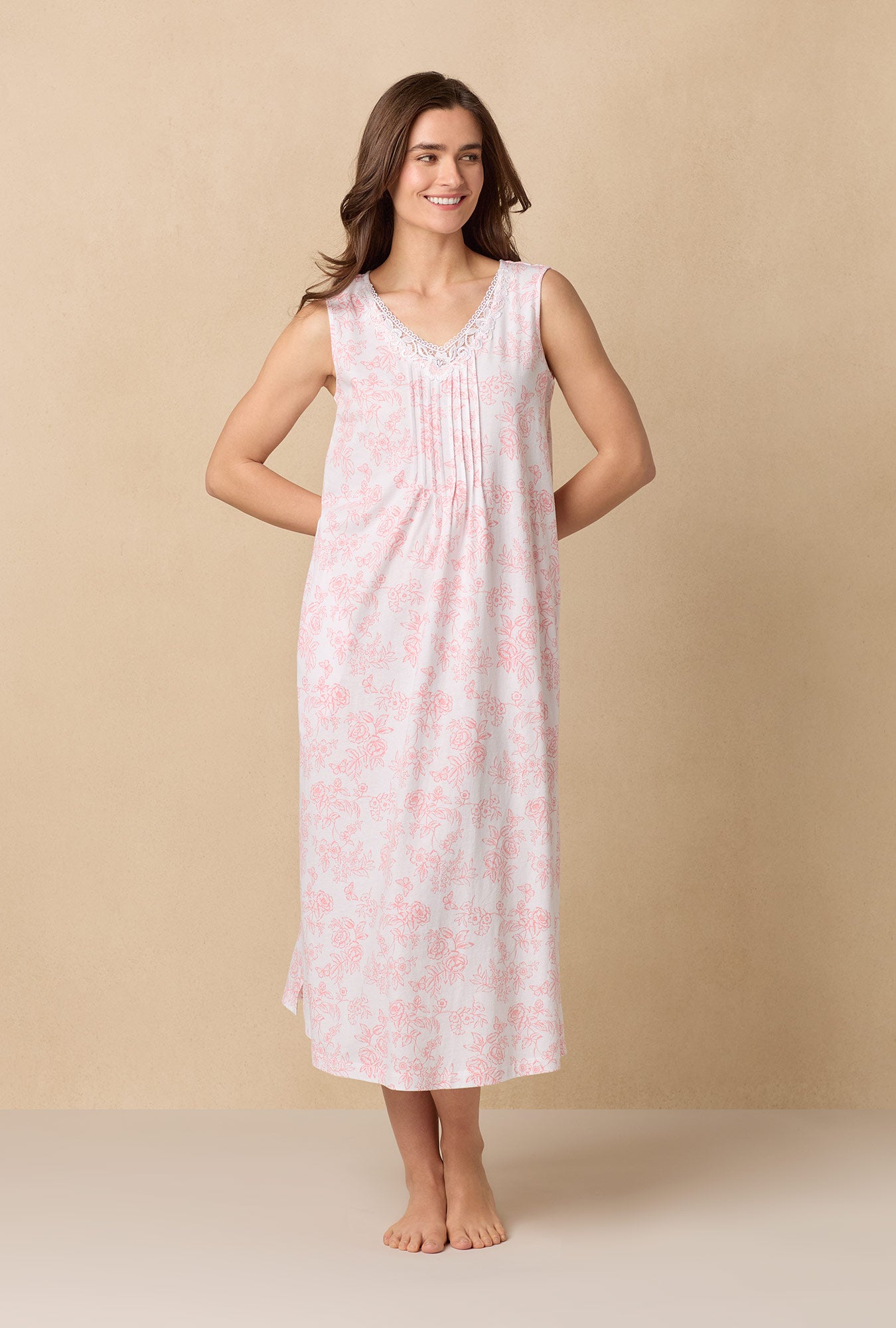 A lady wearing Coral Toile Long Sleeveless Cotton Knit Nightgown
