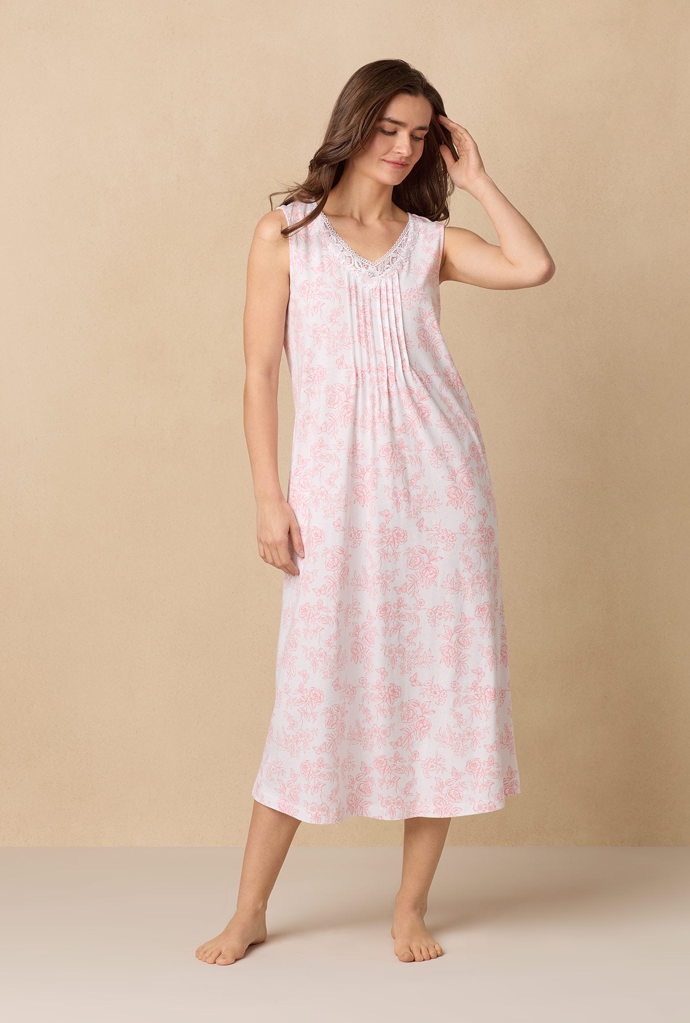 A lady wearing Coral Toile Long Sleeveless Cotton Knit Nightgown