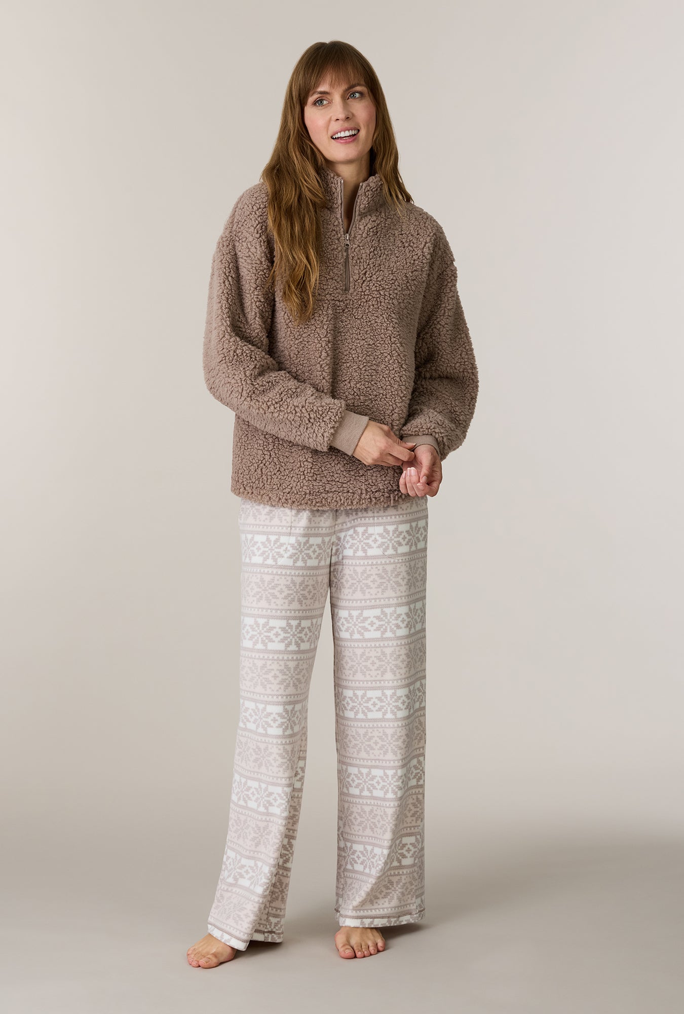 A lady wearing Oatmeal Fair Isle Sherpa Zip Top & Stretch Fleece Pajama Set