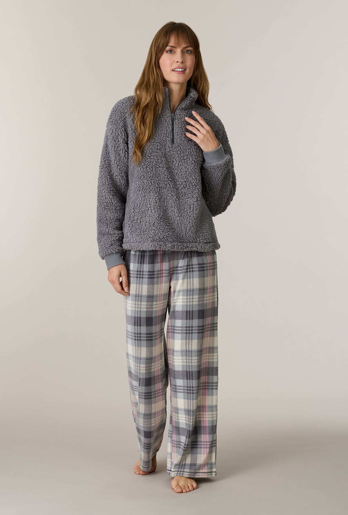 A lady wearing Charcoal Plaid Sherpa Zip Top & Stretch Fleece Pajama Set