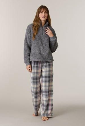 A lady wearing Charcoal Plaid Sherpa Zip Top & Stretch Fleece Pajama Set