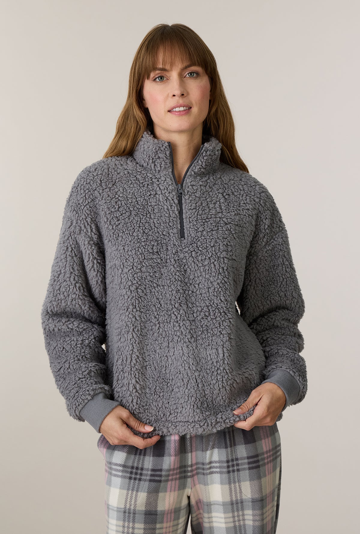 A lady wearing Charcoal Plaid Sherpa Zip Top & Stretch Fleece Pajama Set closer look