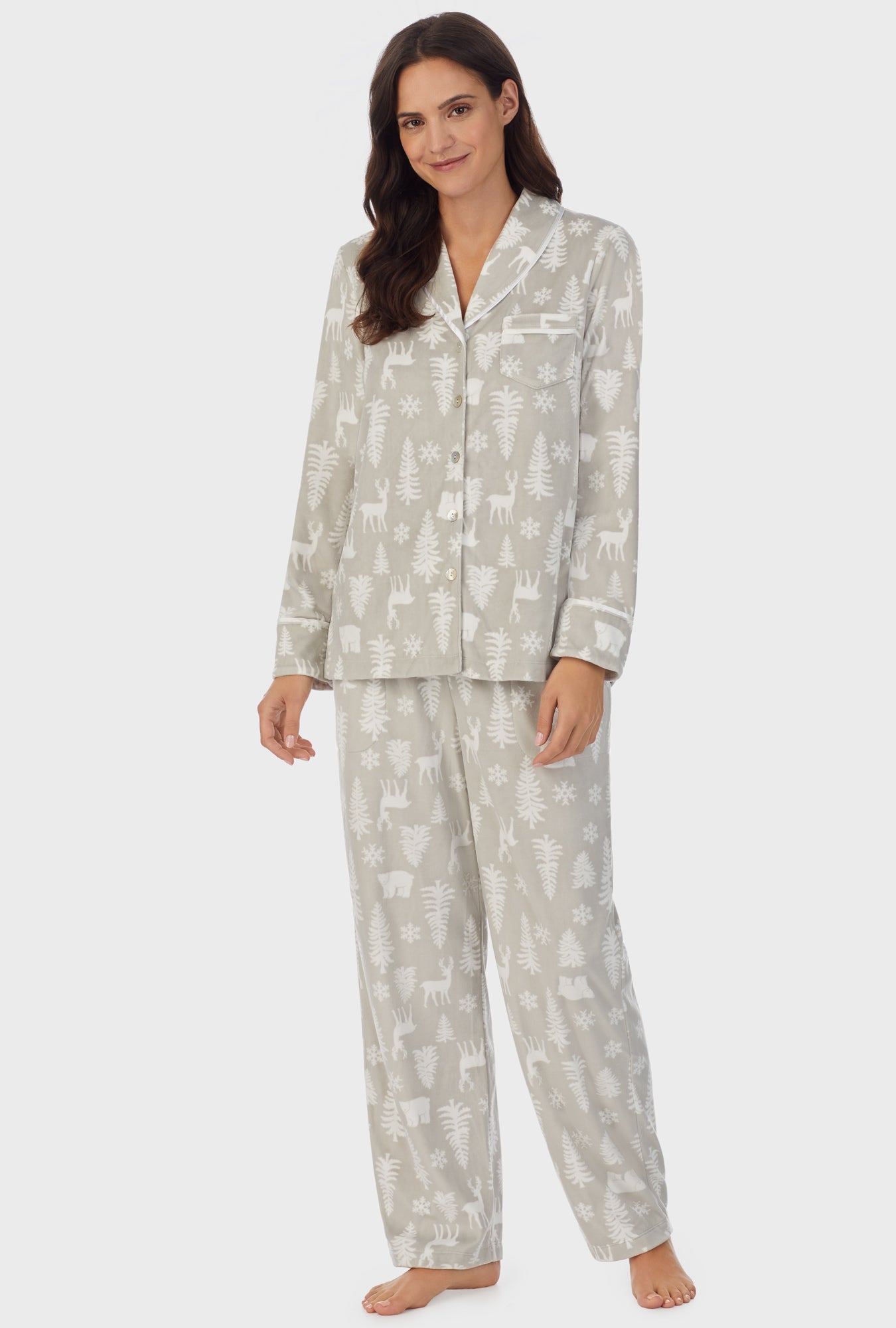 A lady wearing winter forest cozy fleece pajama