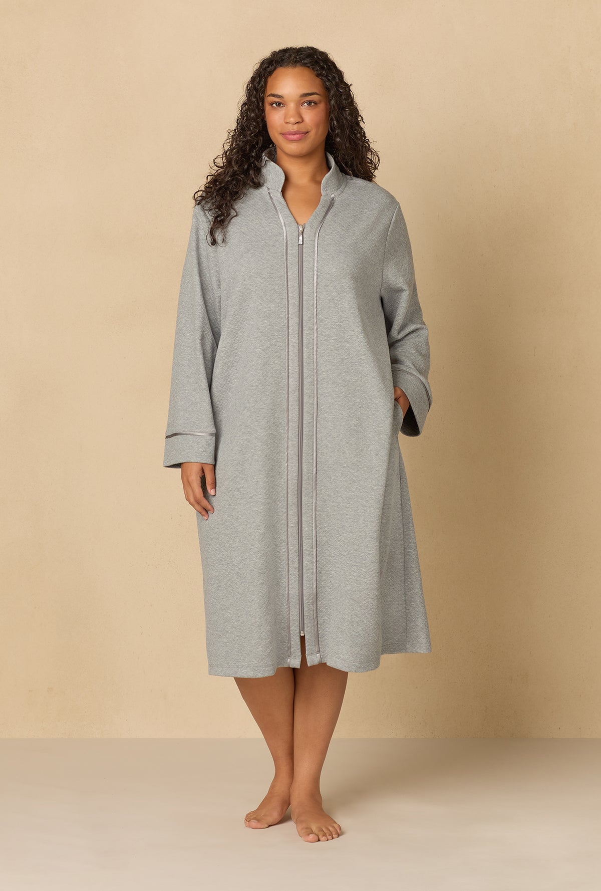 A lady wearing Heather Grey Diamond Quilted Plus Zip Robe