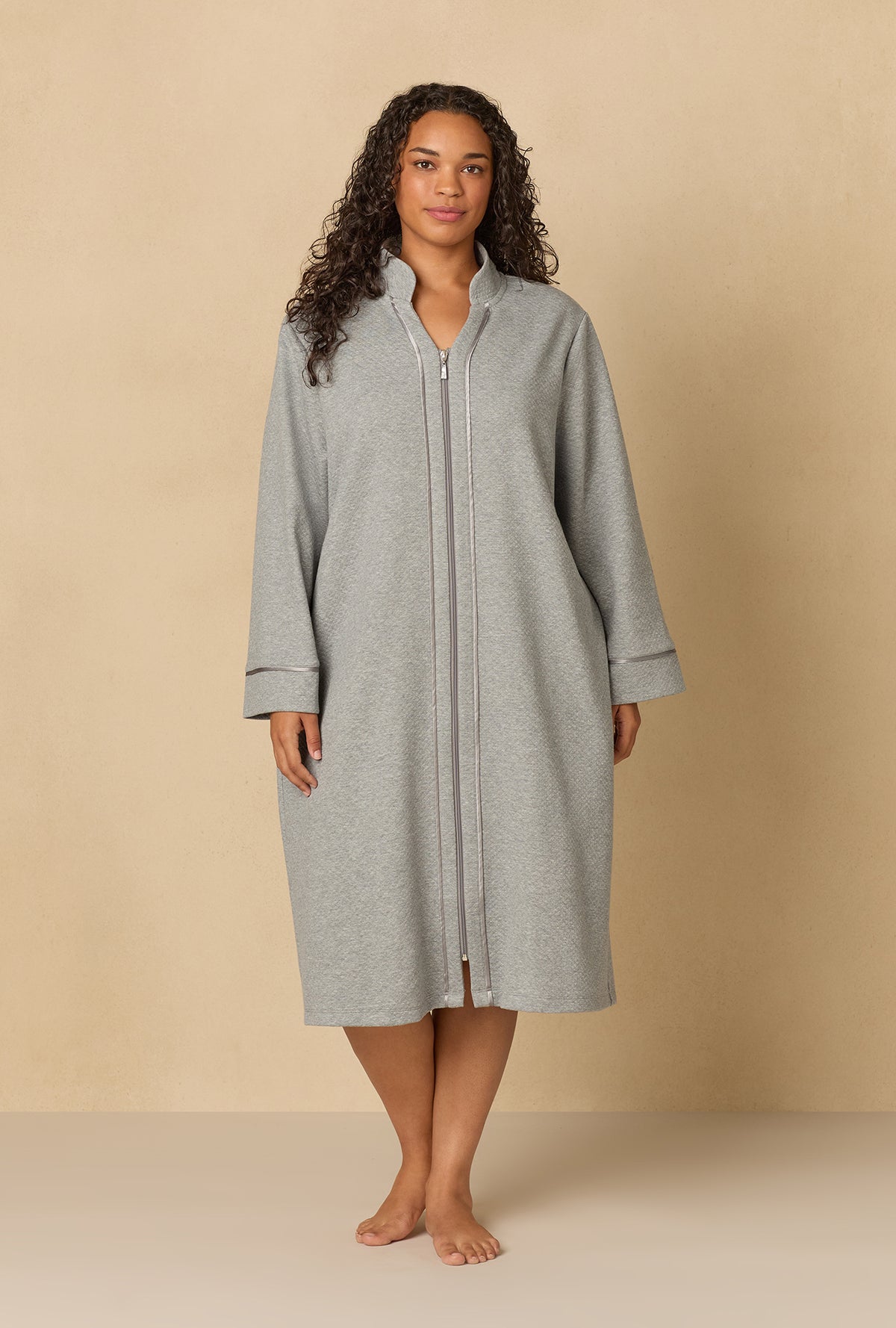 A lady wearing Heather Grey Diamond Quilted Plus Zip Robe