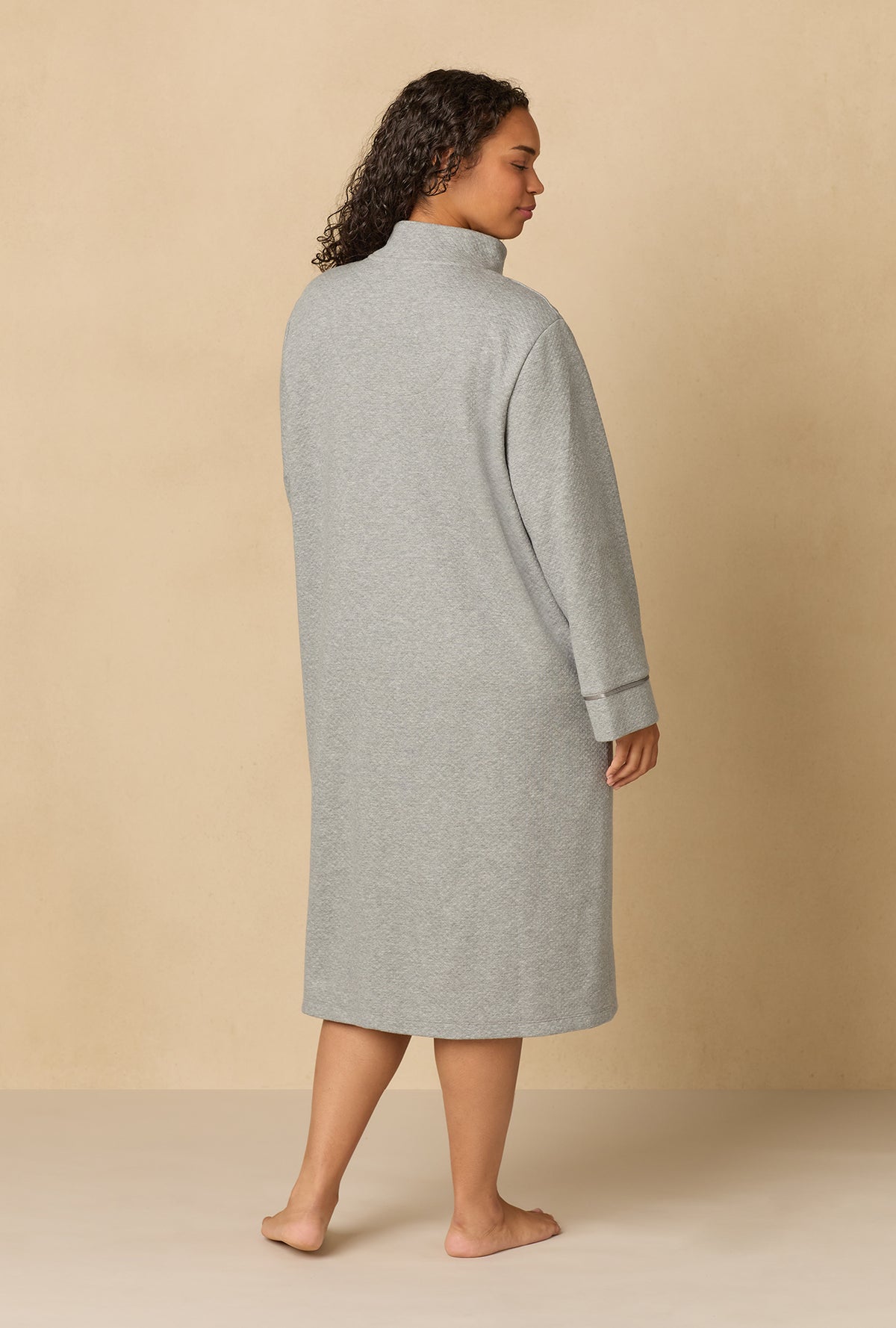 A lady wearing Heather Grey Diamond Quilted Plus Zip Robe