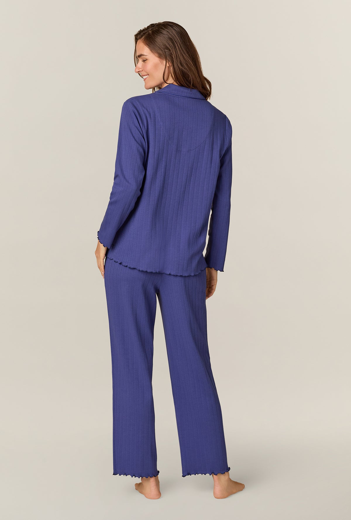 A lady wearing Navy Pointelle Long Pajama Set