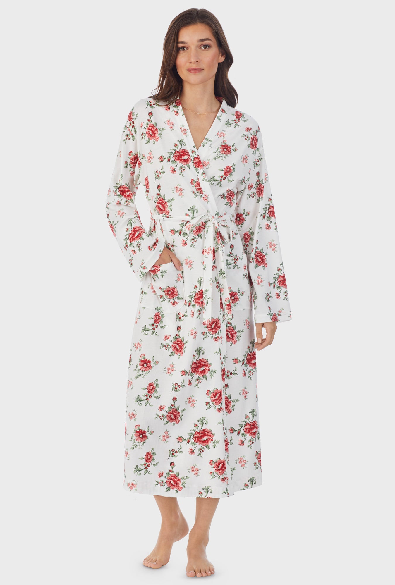 A lady wearing long sleeve cotton wrap robe with royal garden print.