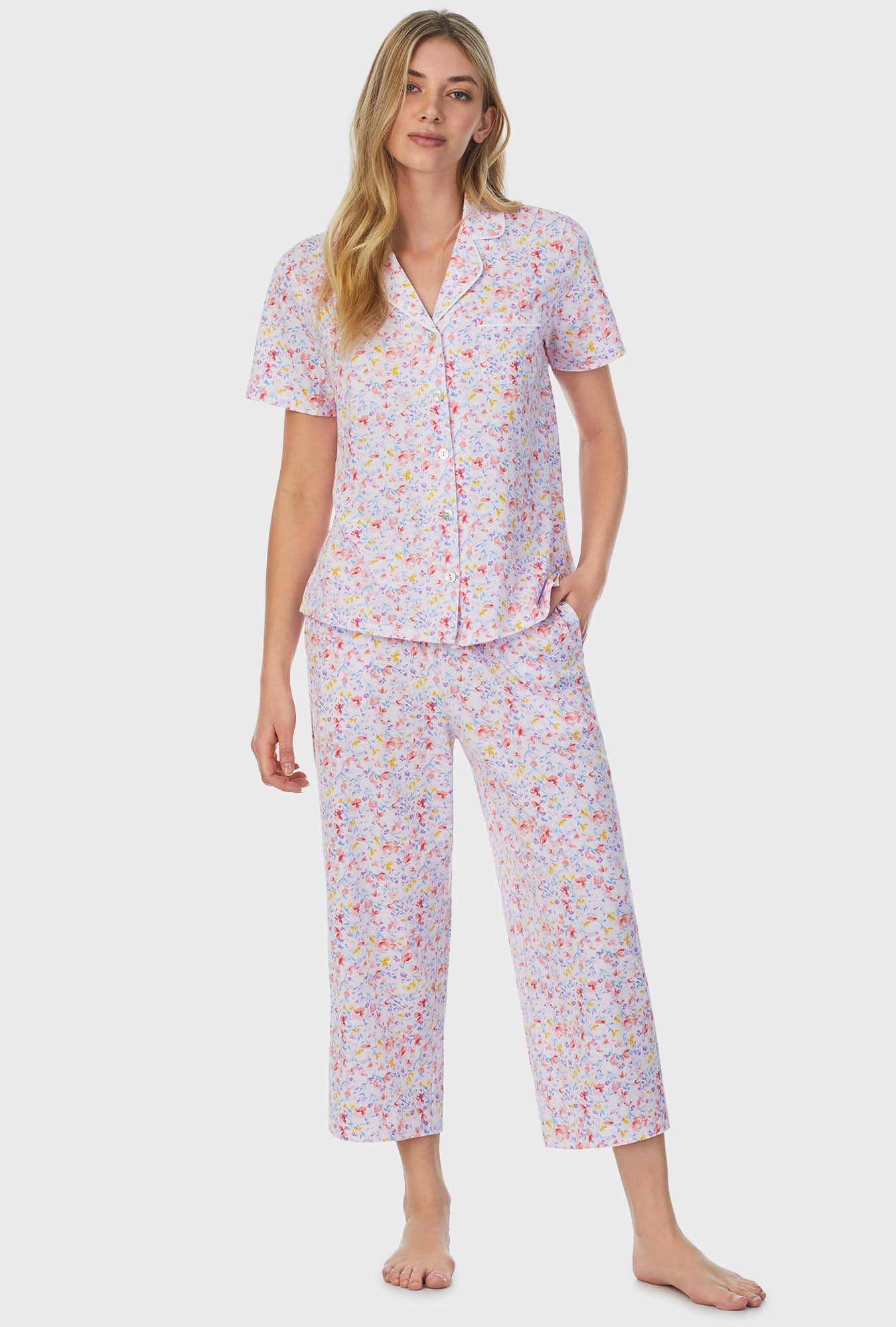 A lady wearing white short sleeve Capri Pajama Set with Garden Floral print