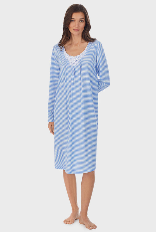 A lady wearing blue long sleeve cotton waltz nightgown with blue stripe print.