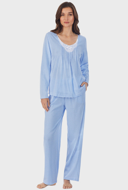 A lady wearing blue long sleeve cotton long pajama set with blue stripe print.